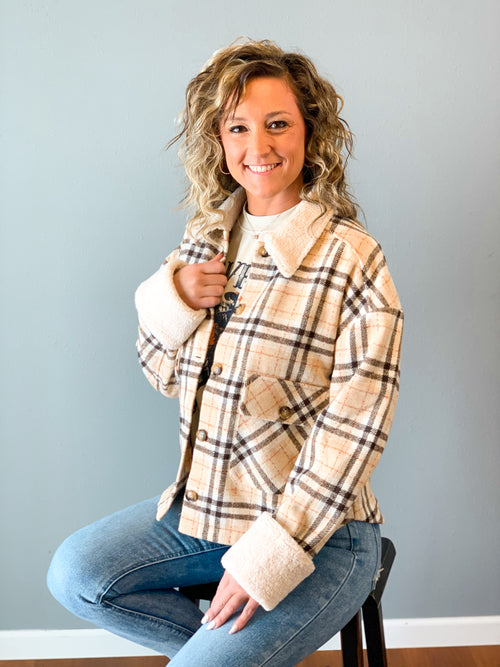 Very J sherpa fleece beige, black, and red plaid jacket with oversized cuffs, front pockets, and buttons