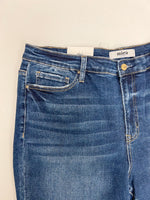Close up of Duluc high rise ankle skinny jeans to see pocket feature