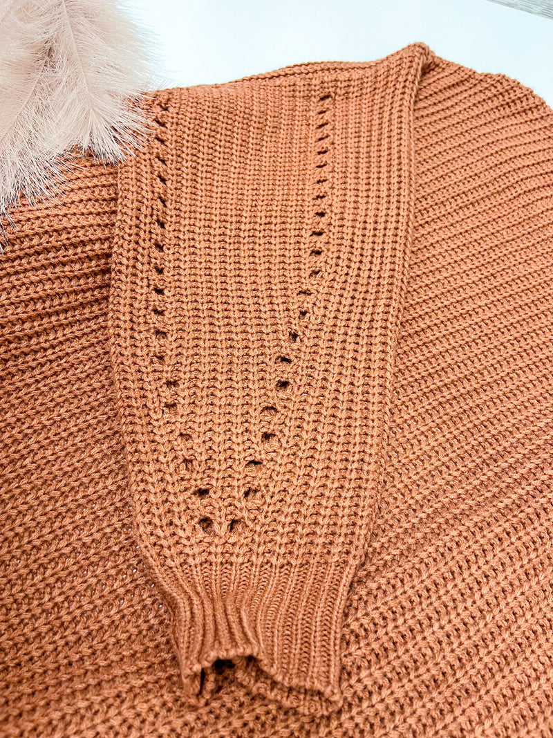 Sleeve detail of rust colored Rose Open Knit Cardigan