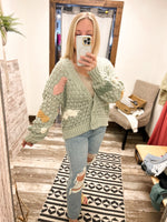 Collective Rack multi-color button up cardigan in sage, ivory, camel, and pink
