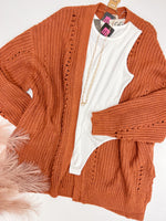Rust colored Rose Open Knit Cardigan paired with bodysuit