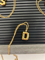 Gold bubble letter necklace D