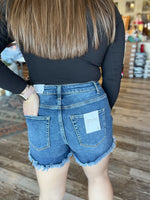 Distressed High Rise Dark Denim Shorts