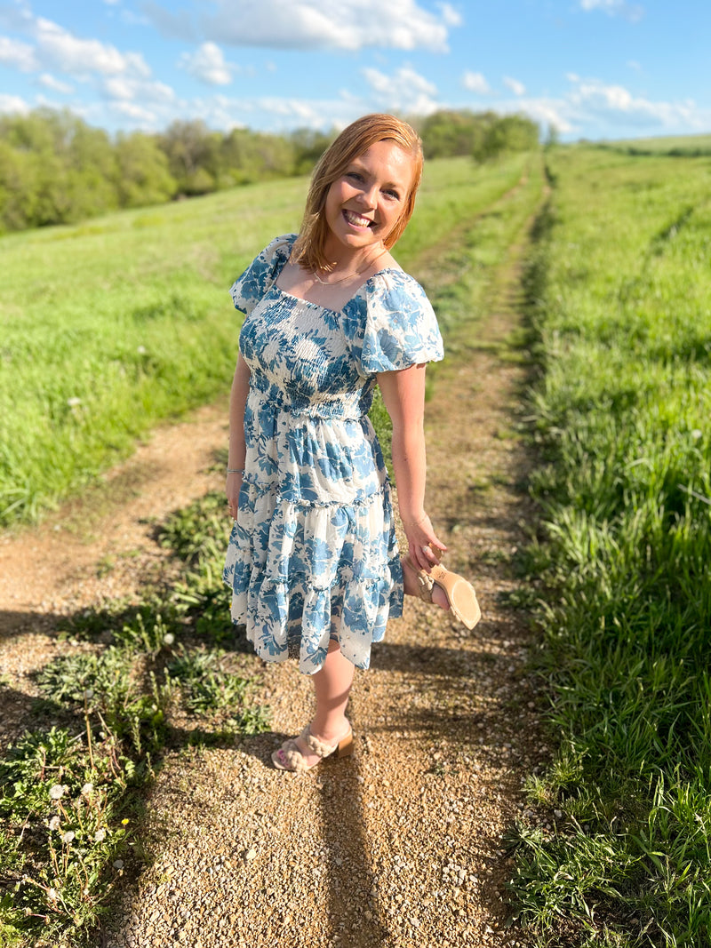 blue and cream floral mini dress with puff sleeves