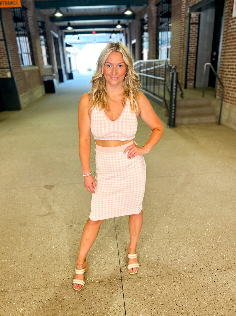 light pink and white checkered v-neck tank top and midi skirt set