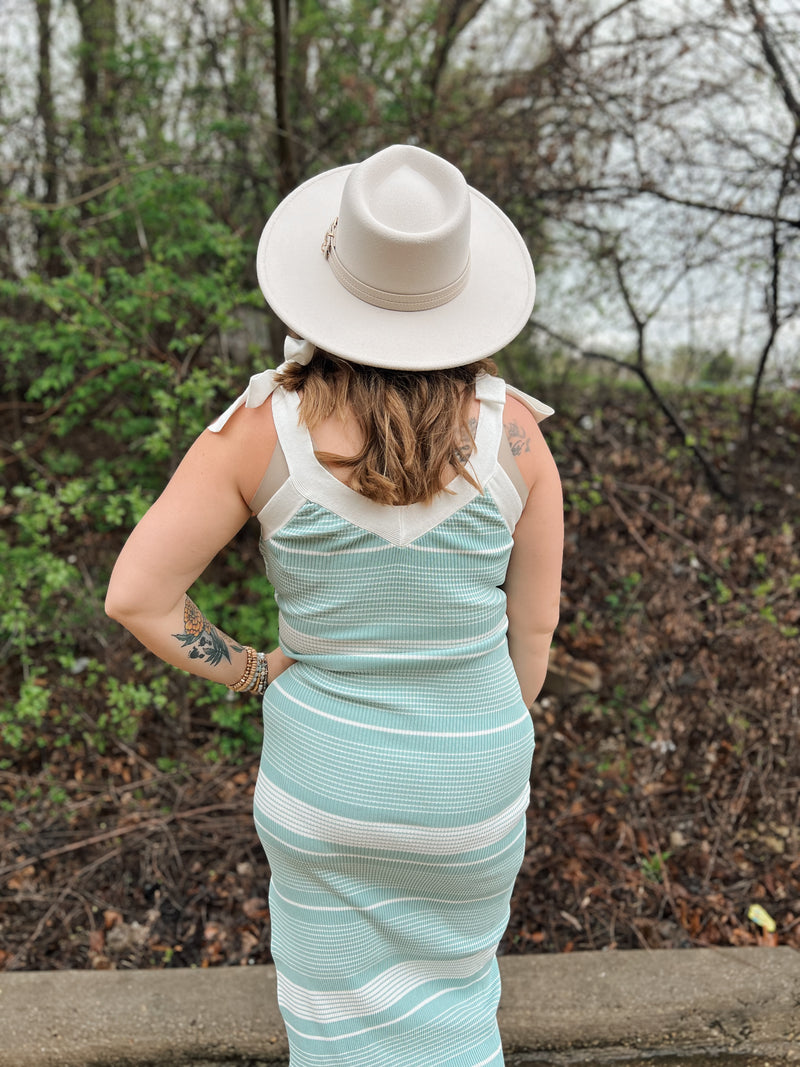 teal and cream striped sweater dress with self-tie straps and slit