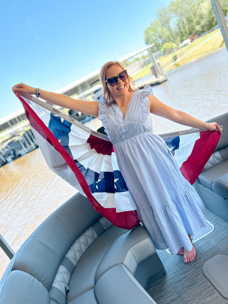 light blue striped deep v midi dress with ruffle sleeves