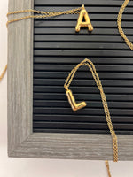 Gold bubble letter necklace L