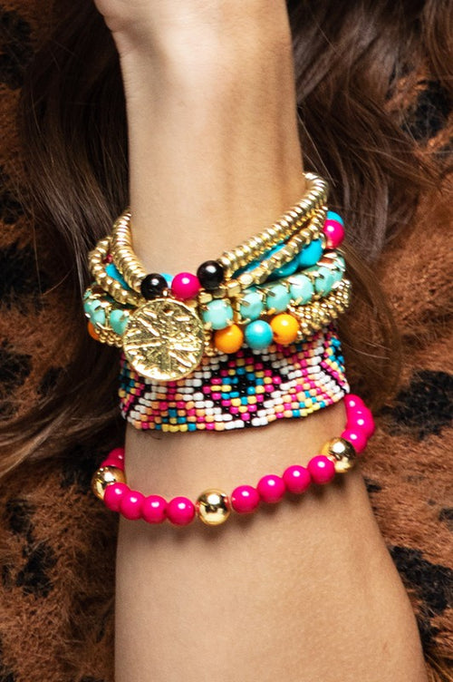 Pink multi color stretch bracelet set with Aztec charm