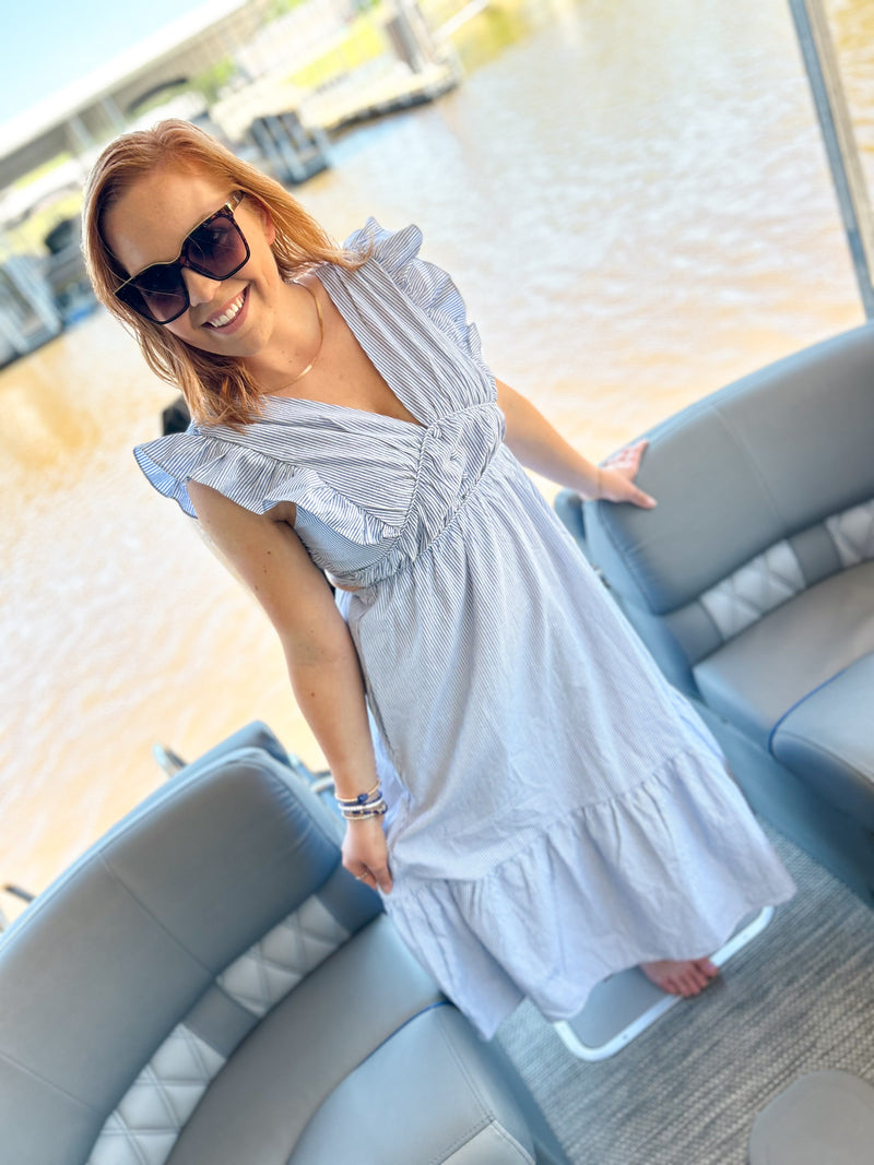 light blue striped deep v midi dress with ruffle sleeves