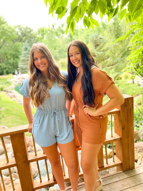 v-neck drawstring waist rompers in light blue and rust