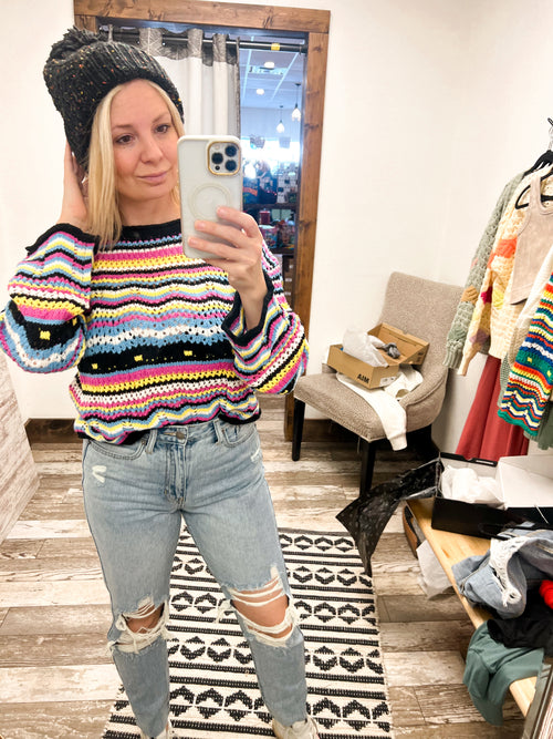 Collective Rack pointelle knit sweater with striped design in black, blue, yellow, pink, and white