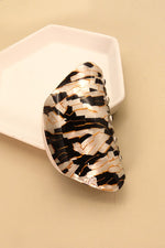 Black, gold, silver shiny oval claw chip