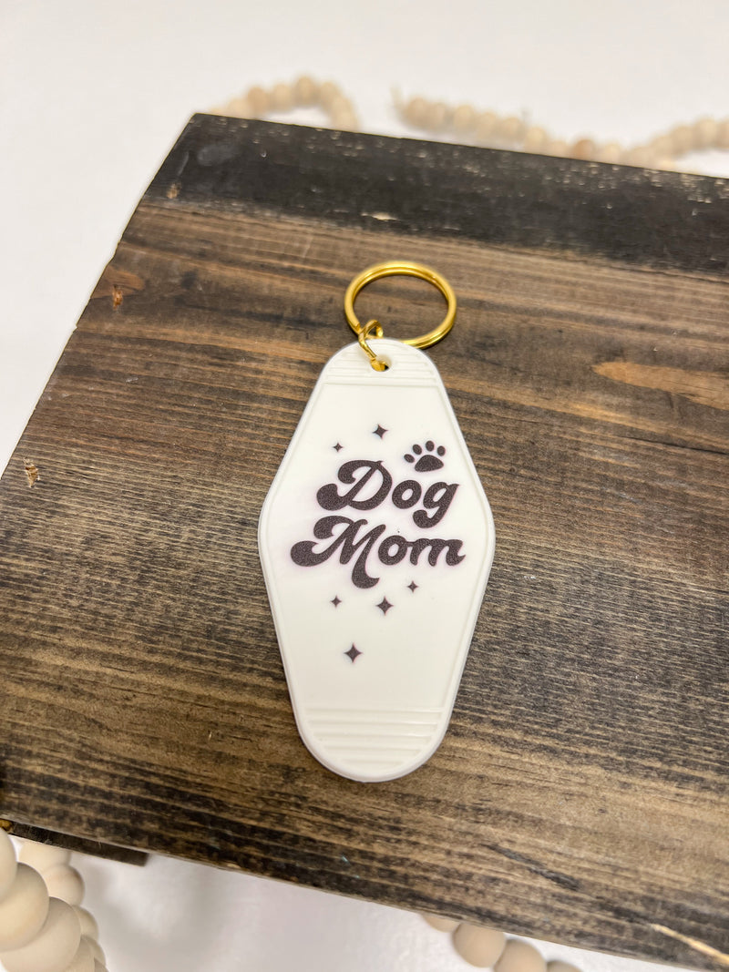 Motel key chains, dog mom