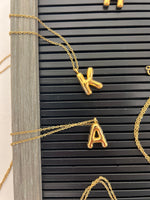 Gold bubble letter necklace K and A