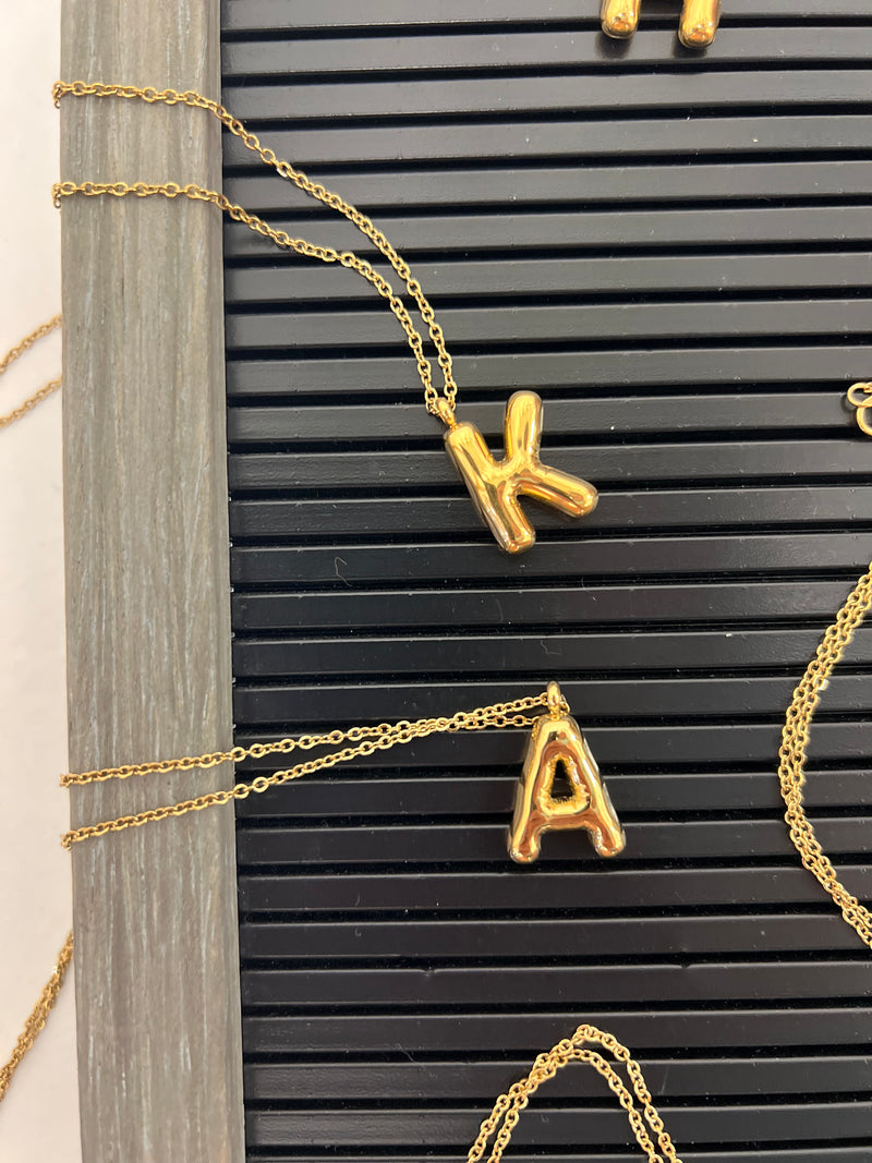 Gold bubble letter necklace K and A