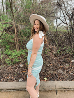 teal and cream striped sweater dress with self-tie straps and slit