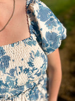 blue and cream floral mini dress with puff sleeves