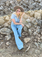 light wash denim flared jumpsuit 