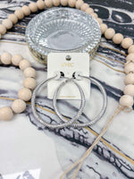 silver textured hoop earring