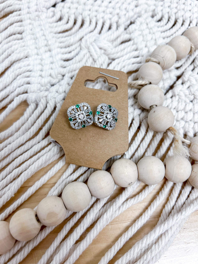 green and silver studs