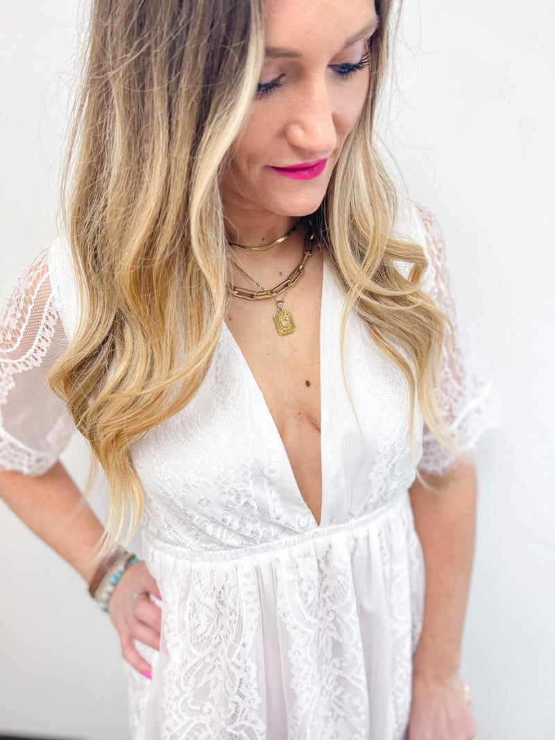 Deep V-neck white lace maxi dress