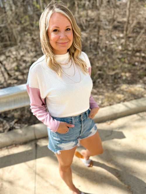 mock neck, drop shoulder long sleeve crop with mauve sleeves 