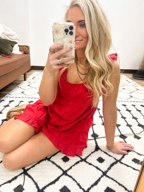 Red ruffle romper with functioning buttons 