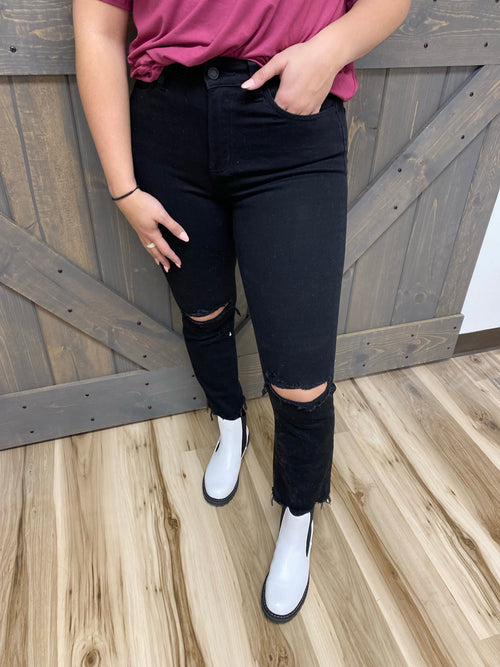 vervet high rise black skinny jeans with distressed knees