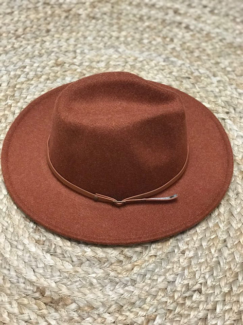 brown hat brown belt fedora hat