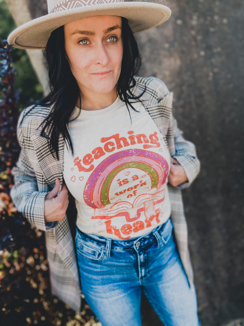 Teaching is a work of heart graphic tee