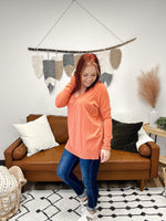 Orange high-low tunic sweater