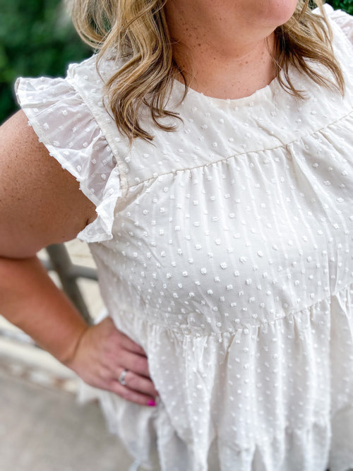 cream swiss dot ruffled tiered top sleeveless blouse