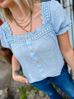 light chambray square neck with lace trim and puff sleeves