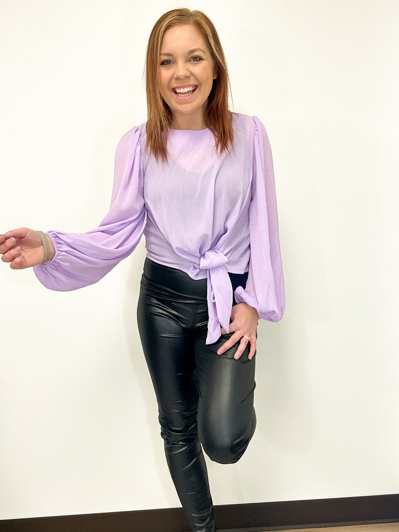 avender sheer blouse with balloon sleeves and a front tie 