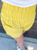Yellow Smocked Windbreaker running shorts